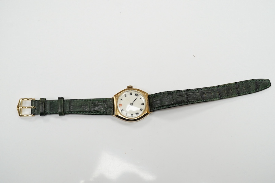 A gentleman's 1950's 9ct gold manual wind wrist watch, with Roman dial, signed Rolex movement, with Aaron Lufkin Dennison case, case diameter 29mm, on an associated leather strap. Condition - poor